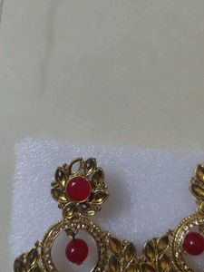 Beautiful Earrings with one stone missing