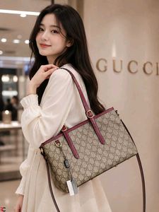 GUCCI GG EMBLEM MEDIUM CANVAS TOTE BAG*