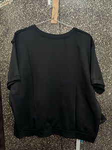 Stylish Black Top with Ruffle Detail