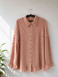 Chic Peach Textured Blouse with Ruffle Hem