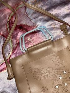 beige elegant sling bag