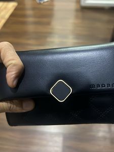 Madame Clutch