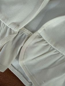 Cream Ruffle Tie-Front Top