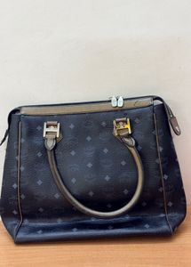 MCM Monogram Lion Detailed Handbag