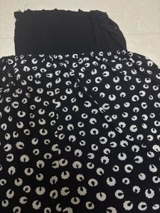 Black &amp; White Patterned Peplum Top with Solid