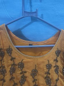 Yellow Embroidered Kurta with attached skirt style