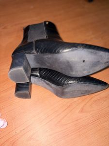 Chic Black Embossed Heeled Boots