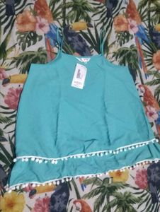 Chic Teal Top with Pom Po