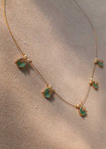 Elegant Gold Necklace with Gemstone Details