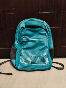 Teal Backpack with Geometric Design