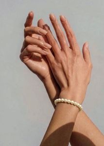 Delicate Pearl Necklace with Gold Accent