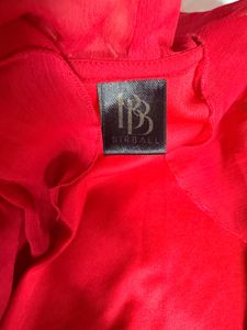 Vibrant Red Ruffled Blouse