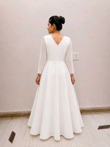 elegant white gown with floral emblishmnent