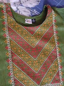 Elegant Green Kurta with Embellished Neckline