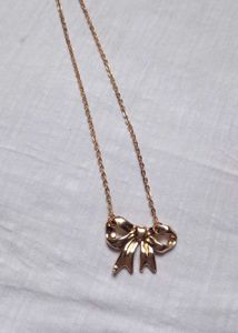 Gold Tone Bow Necklace