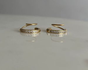 Gold Tone Crystal Embellished Spiral Earrings