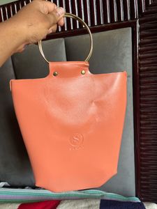 Chic Coral Hobo Bag with Gold Ring Handle