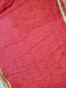 Stunning Orange Saree with Gold Motifs