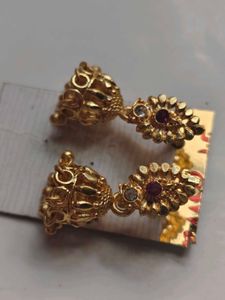 Elegant Gold Jhumka Earrings with Stone