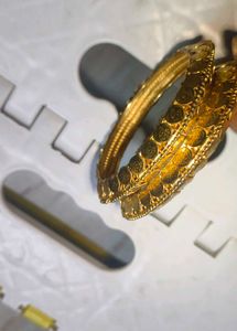 Gold toned lakshmi roopu Bangles (Set of 2)