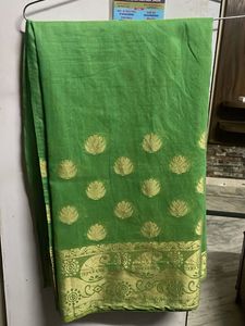 Vibrant Green Saree with Gold Border