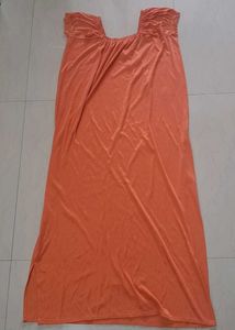 Elegant Orange Gown with Smocked Neckline
