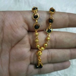 Elegant golden colour Mangalsutra with Black Beads