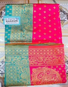 Beautiful Pink Silk Saree with Teal Border