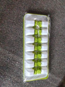 Unused ICE TRAY WITH CAP..