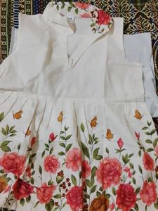 cream short frock with flower print