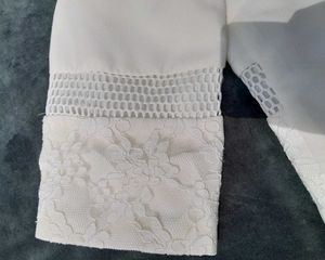 Elegant White Lace Jacket.