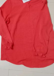 Coral Long Sleeve Top with Ruffled Cuffs
