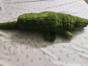 cozy alligator plushie