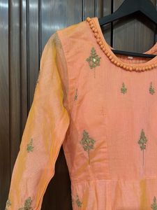 embroidered orange anarkali suit