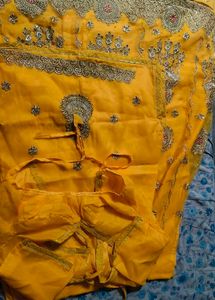 Embroidered Yellow Rajasthani poshak.