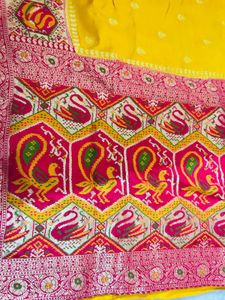 Vibrant Yellow Silk Saree with Intricate Weave