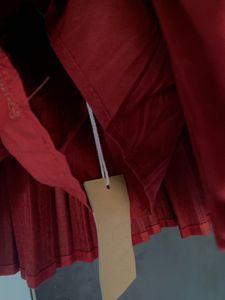 Red Pleated Skirt with Bows