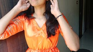 Vibrant Orange Kurta Set with Golden Accents