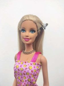 Barbie doll with pink dress