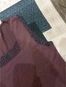 Stylish Sleeveless Top with Crochet Detail