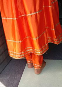 Vibrant Orange Kurta Set with Golden Accents