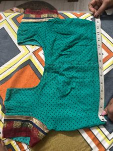 Beautiful Teal Blouse with Intricate Details