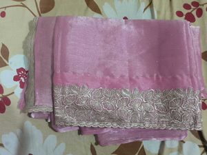 Elegant Pink Saree with Intricate Embroidery