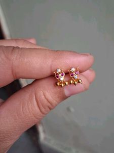Gold  Jhumka Earrings with Red Stones