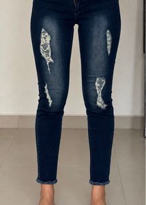 Distressed Blue Denim Jeans