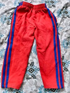 Two pants. Red Jogger Pant and blue jeans Capri fo