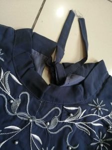 Embroidered Peplum Top