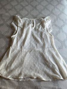 Elegant White Embroidered Peplum Top