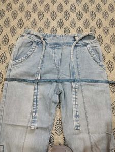 Light Wash Wide Leg Jeans with Embellishments