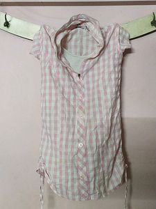 Checked atlomst knee length top with beautiful neck model and zip